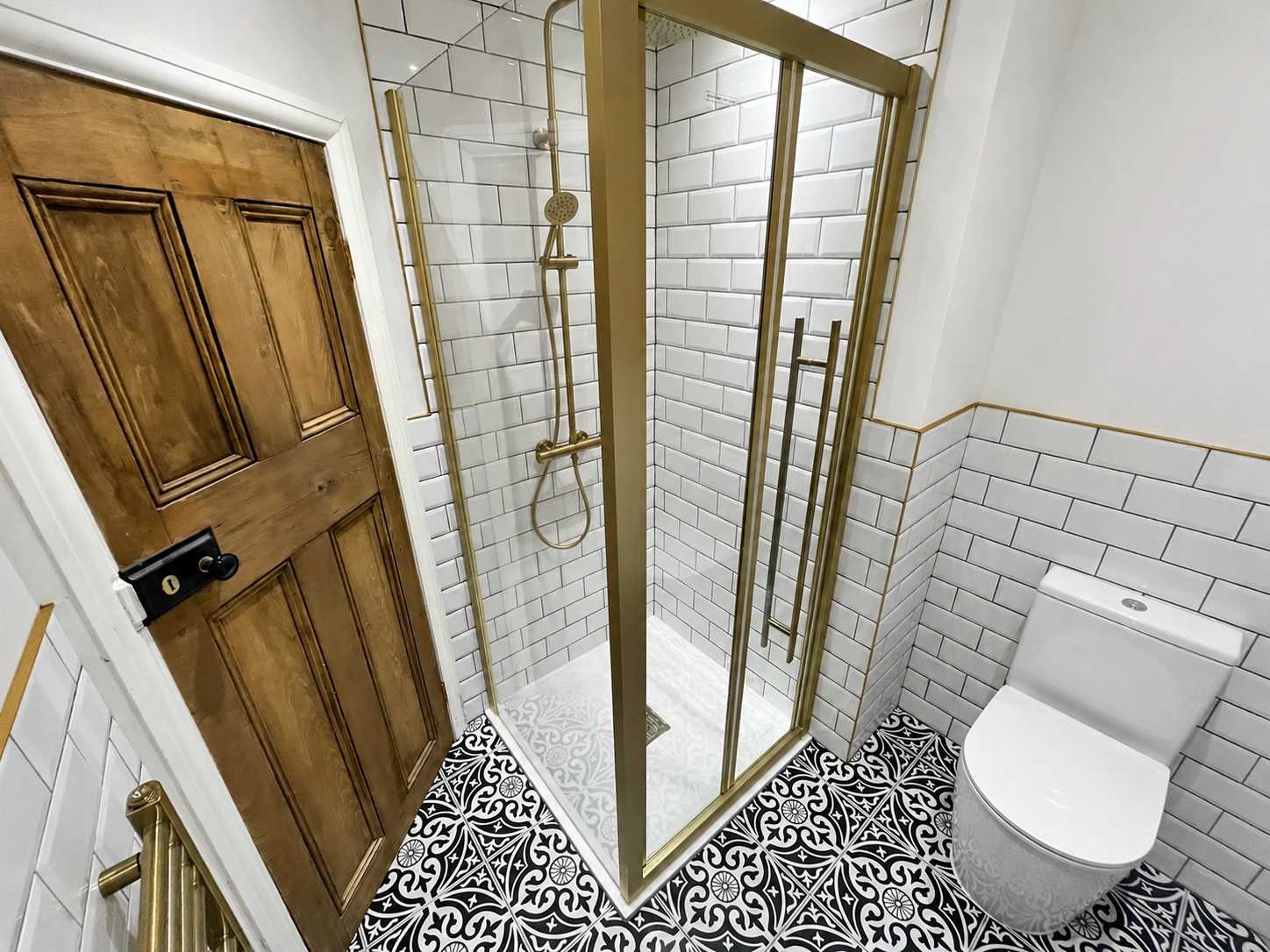 Completed brass shower installation in Leeds